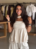 cream polka dot top